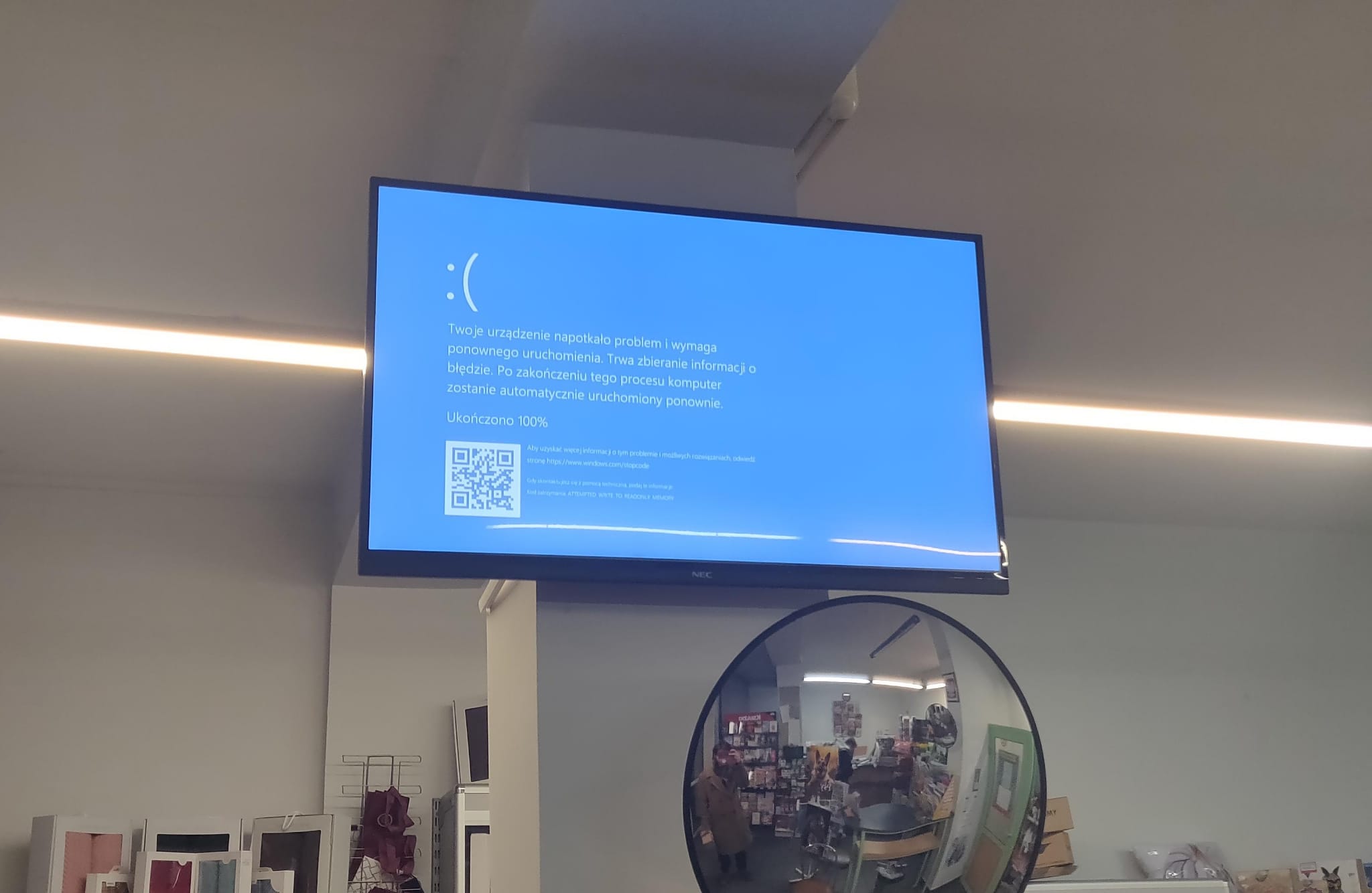 At the post office, a screen on display is showing Windows' blue screen of death